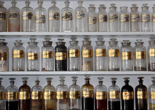 Glass jars on shelf.