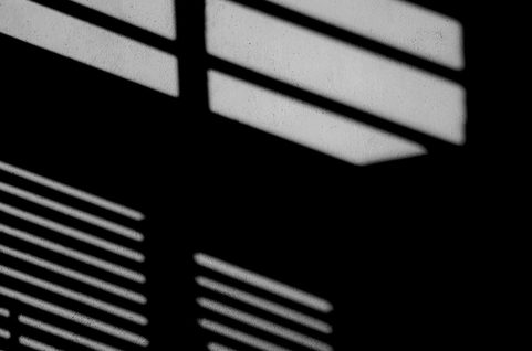 Dark shadow on wall
