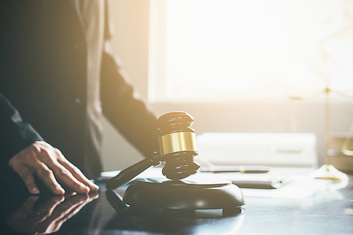 Gavel on table. Photo.