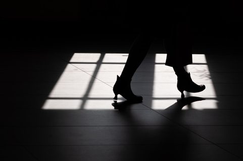 Shadow of female feet.
