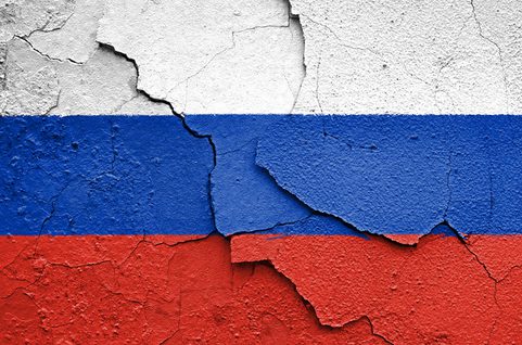 Russan flag painted on cracked concrete