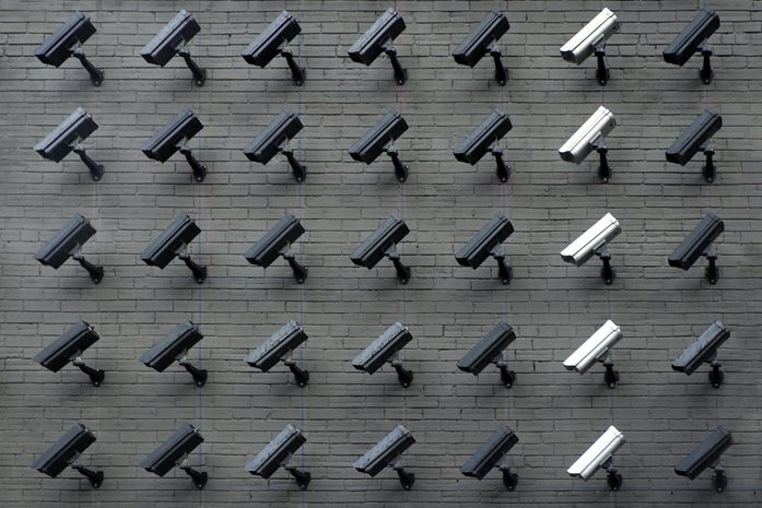 Security cameras mounted on wall.