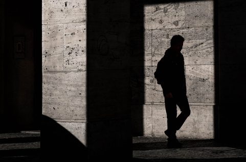 Silhouette of a man walking