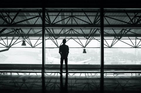 Silhouette of a man waiting for subway